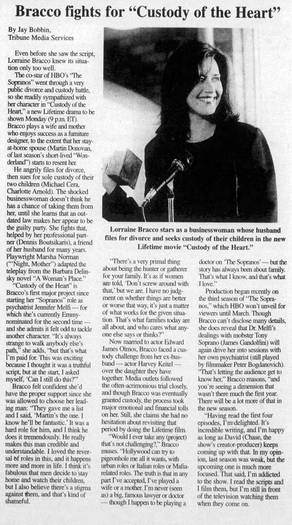 A magazine article spread from George magazine titled "If I Were President: Lorraine Bracco." The layout features a prominent photograph of actress Lorraine Bracco smiling and throwing up peace signs against an American flag backdrop.