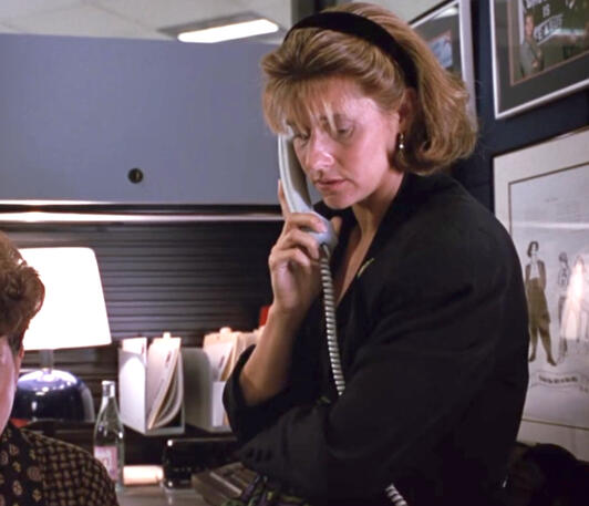 6 Lorraine Bracco as Bobbie on a phone call with Virgil from Talent for the Game.
