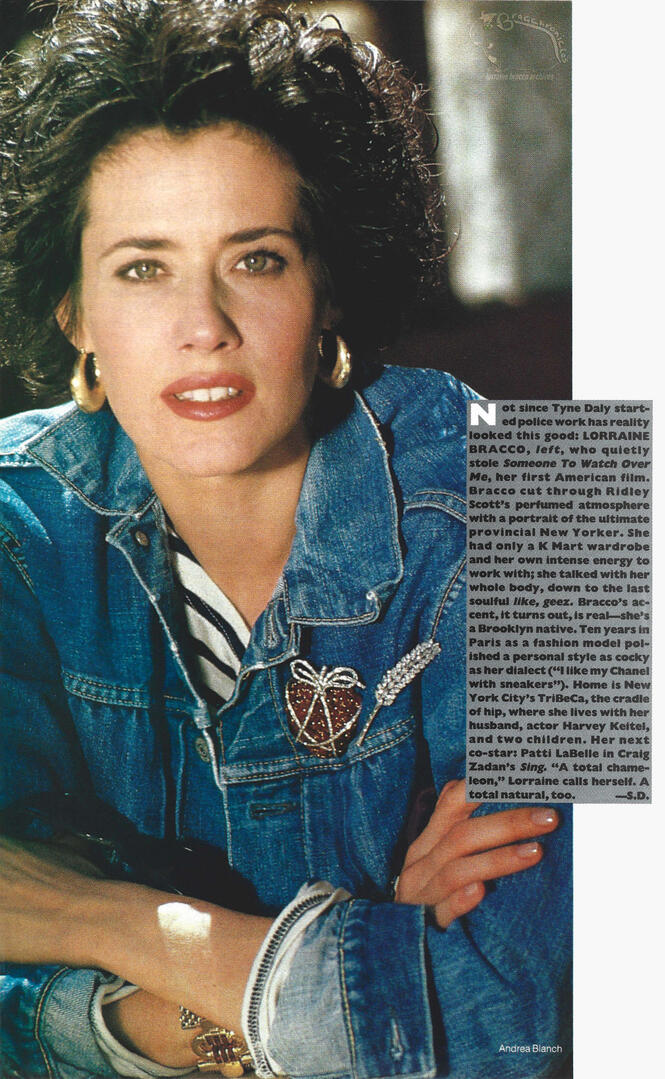 Portrait of actress Lorraine Bracco in a denim jacket with decorative brooches for a Vogue magazine feature article. Photographed by Andrea Blanch with an accompanying text box about her film roles.