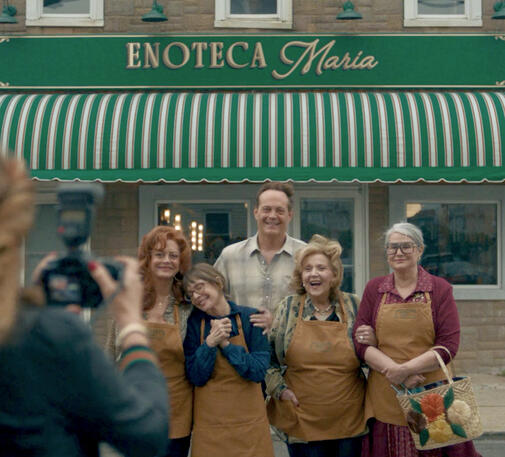 1 Lorraine Bracco and cast outside Enoteca Maria restaurant in a scene from the Netflix movie Nonnas.