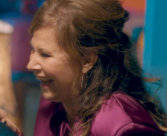 6 Close-up profile of Lorraine Bracco laughing during an episode of Jerk.