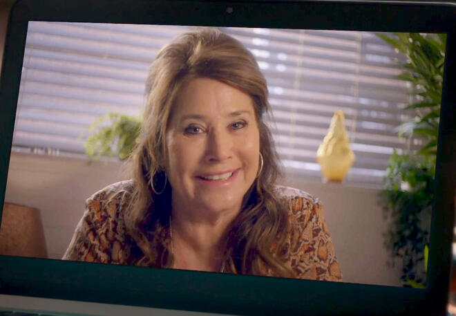 9 Lorraine Bracco smiling through a zoom call screen with her son on the show Jerk.