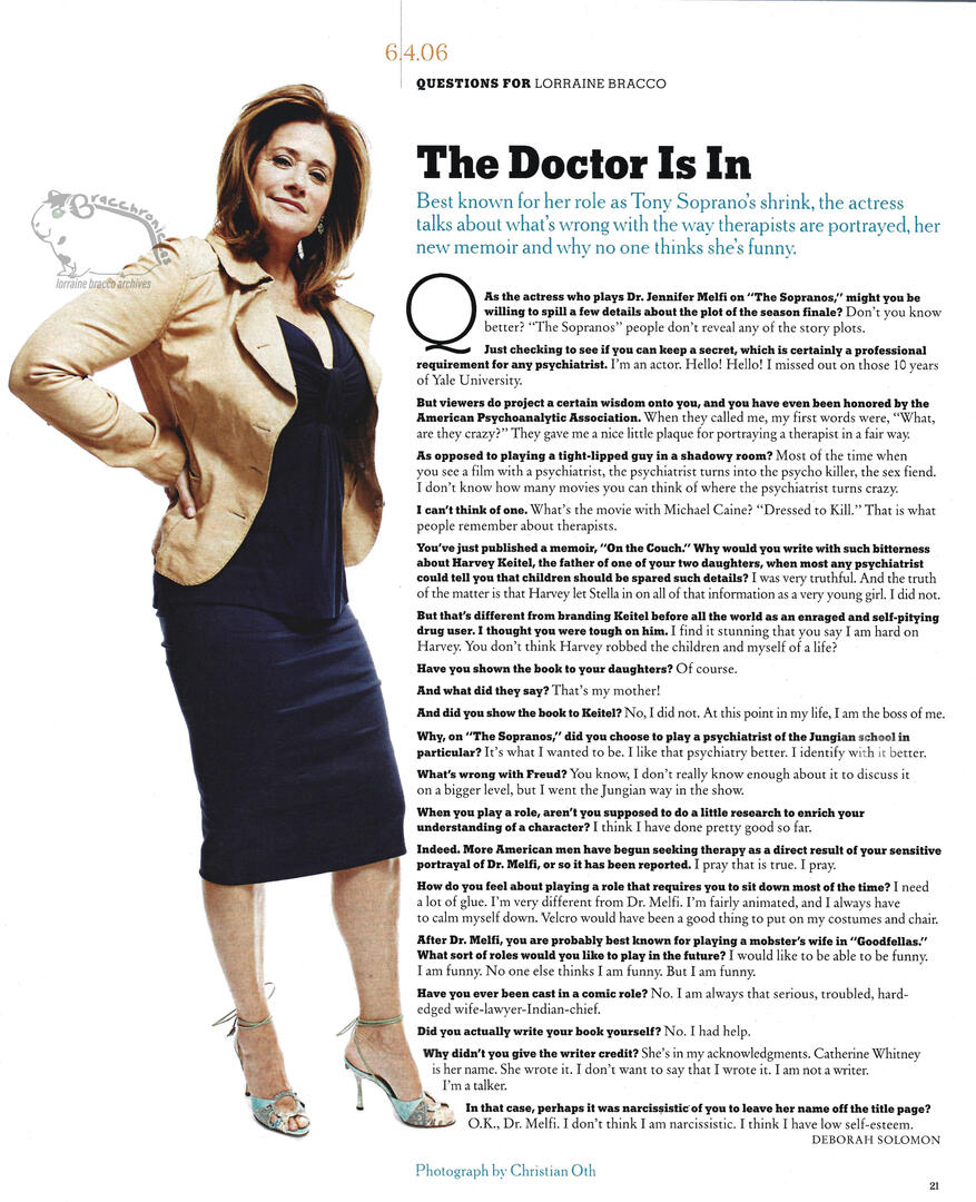 A New York Times article, titled 'The Doctor Is In' featuring an interview with actress Lorraine Bracco by Deborah Solomon. Features a full-body portrait by Christian Oth which shows her posing in a tan jacket, dark navy dress, and blue heels.