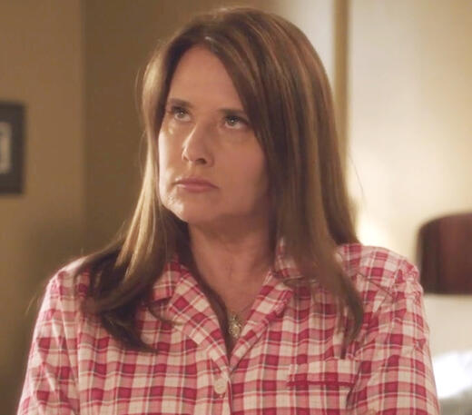2 Lorraine Bracco as Angela Rizzoli looking up and sulking in Rizzoli & Isles