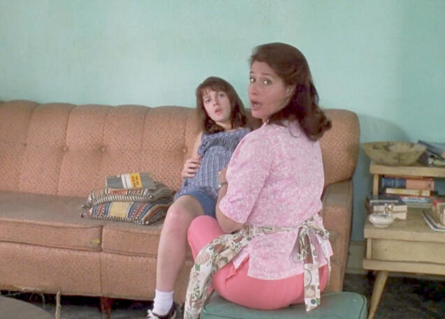 4 Lorraine Bracco looking back towards commotion with Drew Barrymore in Riding in Cars with Boys.