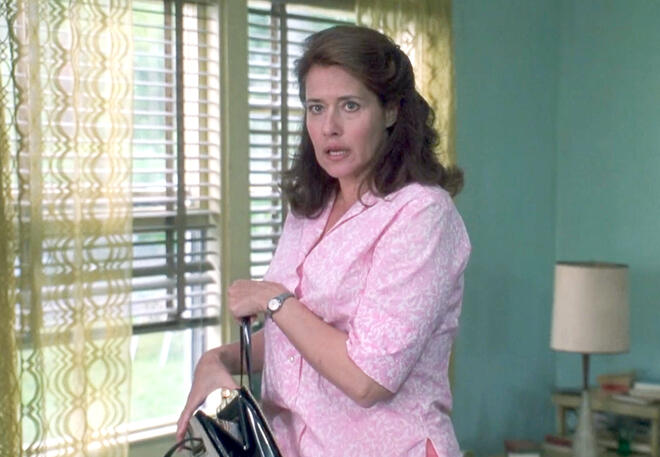 10 Lorraine Bracco judging while clutching her purse in Riding in Cars with Boys.