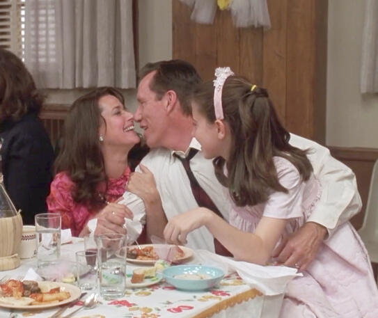 12 Lorraine Bracco at a wedding reception about to kiss James Woods from the movie Riding in Cars with Boys.