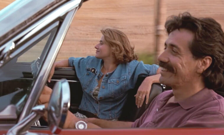 7 Lorraine Bracco and Edward James Olmos driving in Talent for the Game.