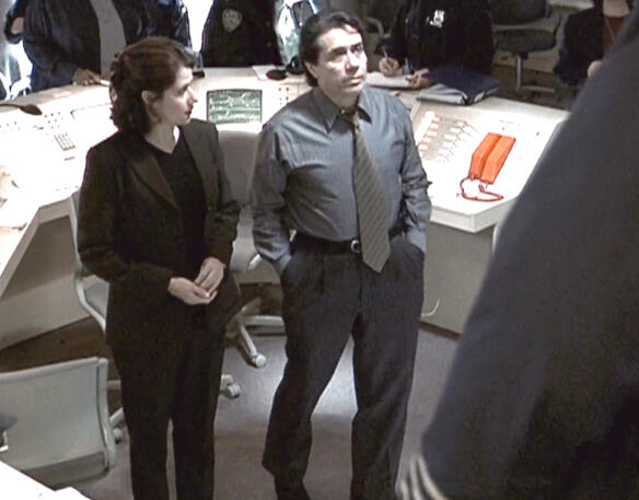 6 Lorraine Bracco and Edward James Olmos standing in the train control room from Pelham 1 2 3.