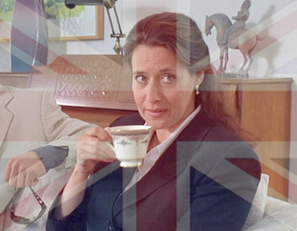 2 Lorraine Bracco drinking tea with a Union Jack flag meme overlay in Silent Cradle.
