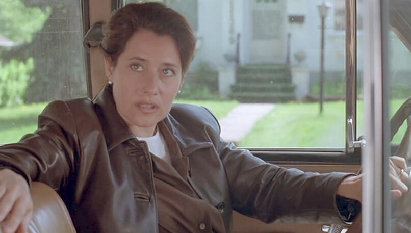 4 Lorraine Bracco wearing a leather jacket inside a car in Silent Cradle.