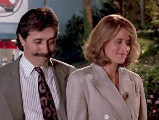 12 Lorraine Bracco and Edward James Olmos walking after the game in Talent for the Game.