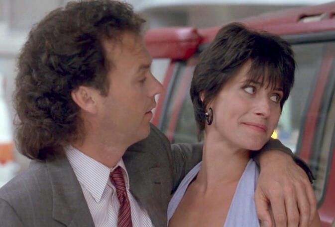 1 Lorraine Bracco with Michael Keaton in a scene from The Dream Team.
