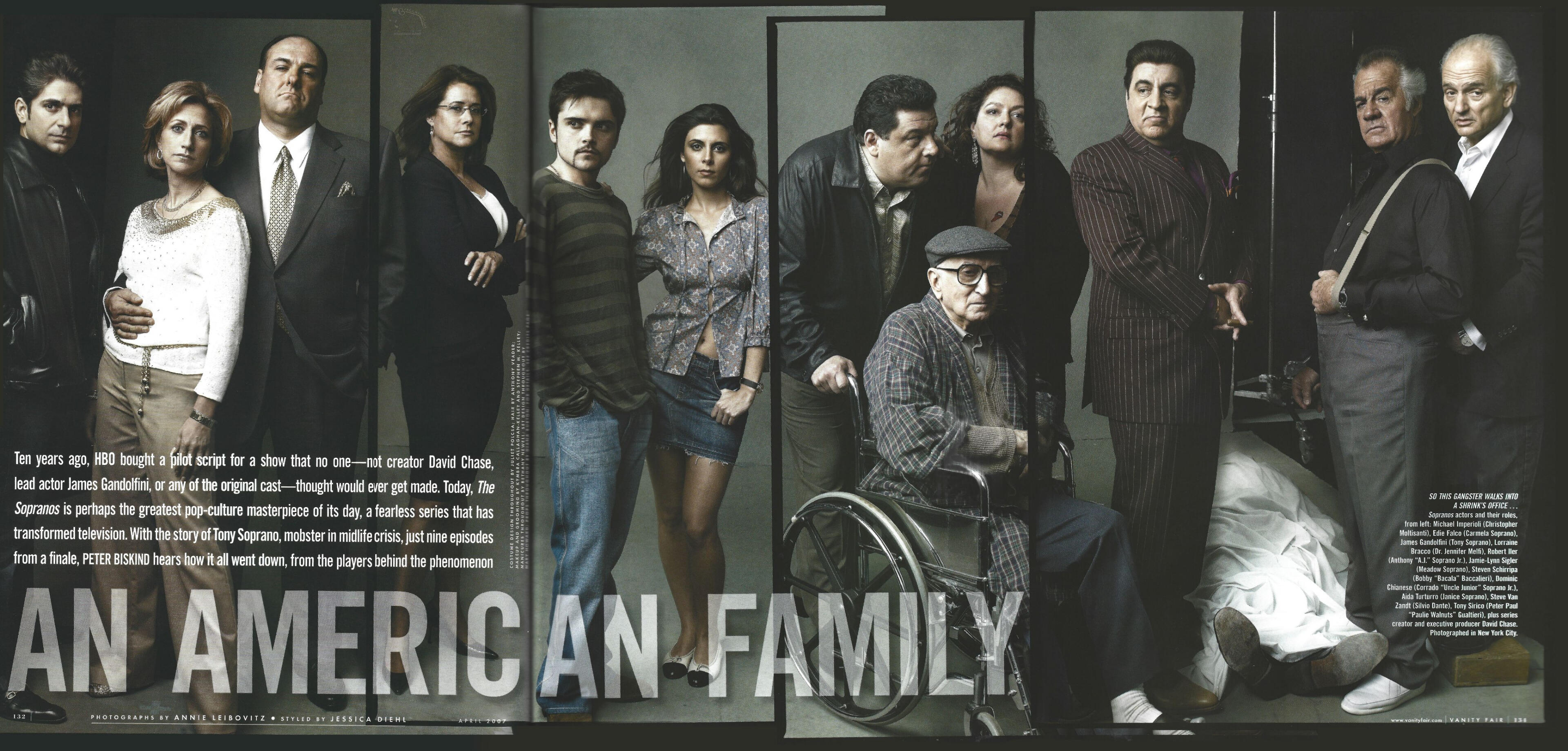 Vanity Fair magazine spread featuring the cast of The Sopranos, photographed by Annie Leibovitz. Actors James Gandolfini, Edie Falco, Lorraine Bracco, and other cast members are posing in a panoramic group portrait titled 'An American Family'