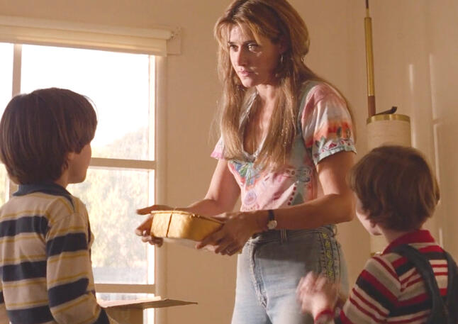 7 Lorraine Bracco talking to Elijah Wood and Joseph Mazzello's characters in their home in Radio Flyer.