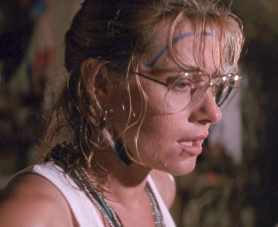 2 Sweating Lorraine Bracco wearing glasses and tank top in jungle, Medicine Man movie.