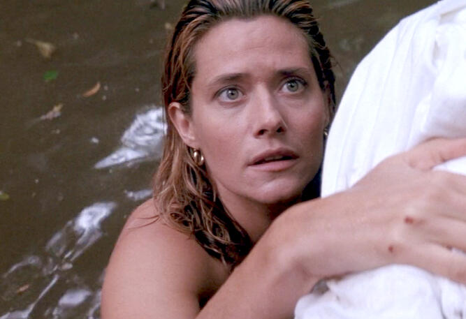 1 Lorraine Bracco looking inquisitive while submerged in water in Medicine Man.
