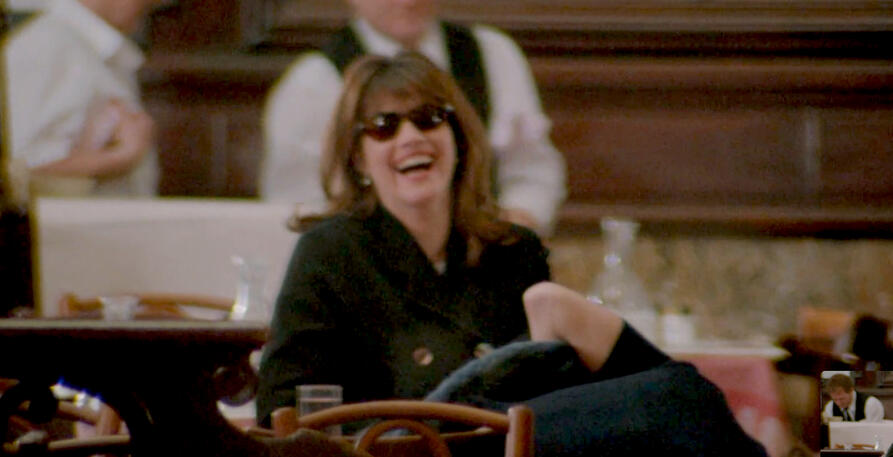 8 Lorraine Bracco laughing in sunglasses at a restaurant in Les Menteurs