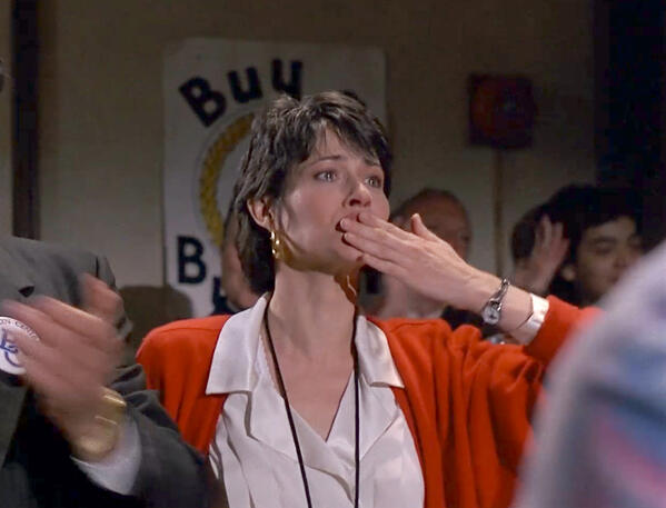 2 Lorraine Bracco blowing a kiss in a scene from the 1989 musical drama film Sing.