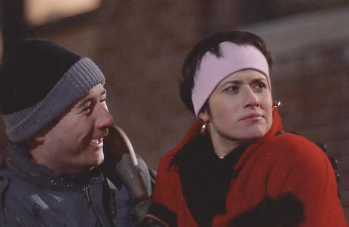 3 Lorraine Bracco wearing a pink headband and winter jacket looking bemused in her movie Sing.