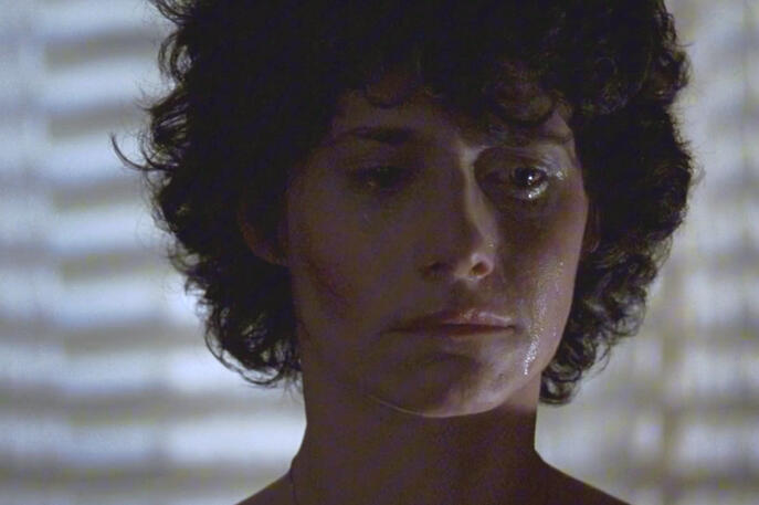 12 Emotional close-up of Lorraine Bracco crying in the movie Someone to Watch Over Me.